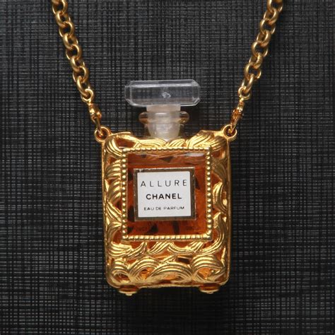 chanel perfume bottle necklace sale.